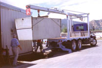 Setting a 1500 gallon tank with the rear set.