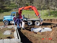 Setting a tank using the side-set truck.